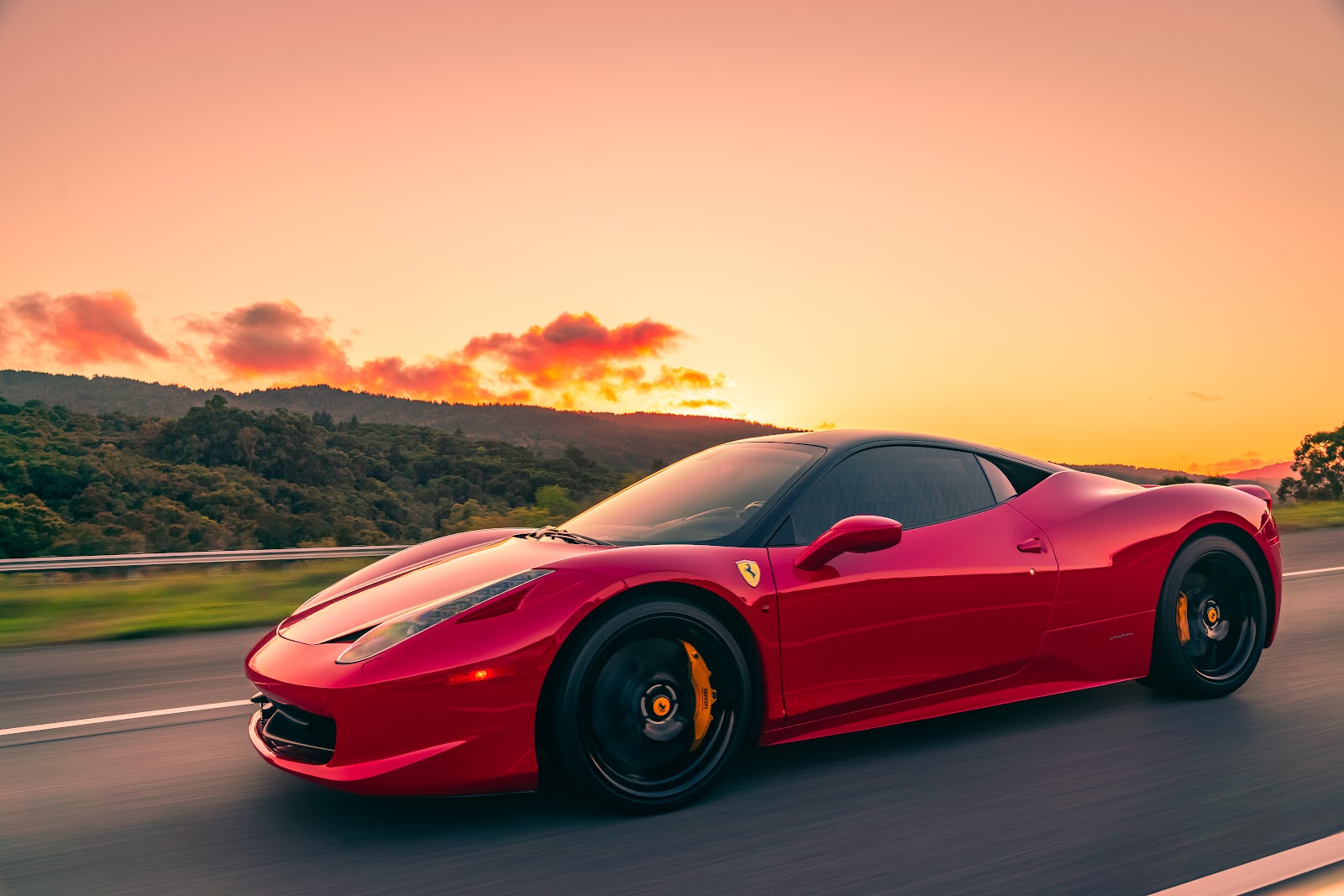Ferrari driving at golden hour for social media content campaigns